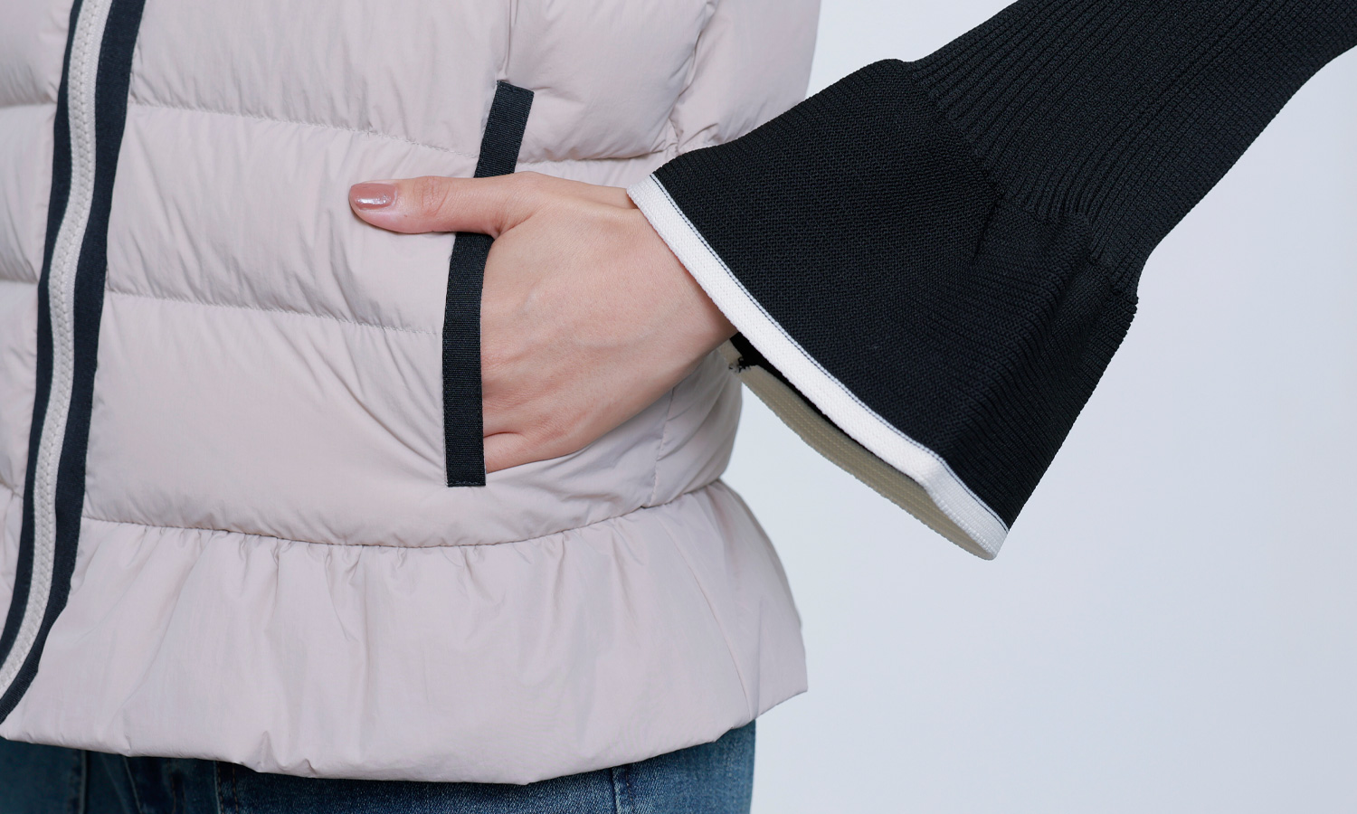 TRECODEのペプラムライトダウンベスト