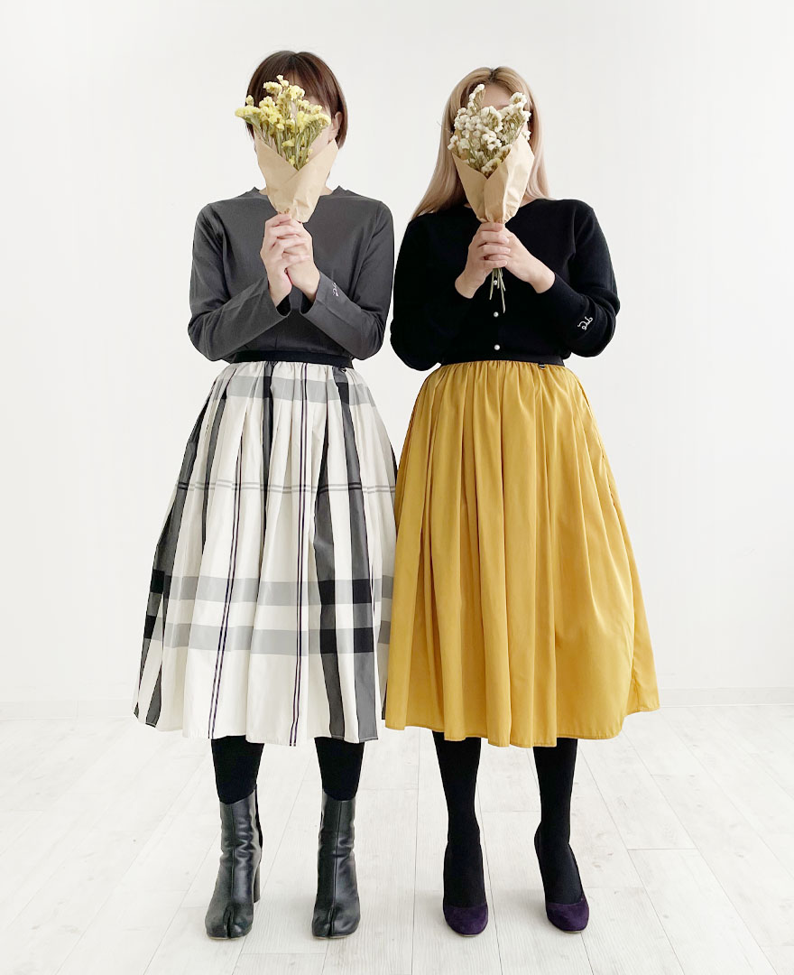 トレコードの人気定番アイテム神戸・山の手スカート。その中でも特に人気のモノトーンチェックと、注目の新色サフラン。ブラックなどのベーシックカラーから赤や紫の秋にぴたっりのカラーも取り揃えています。