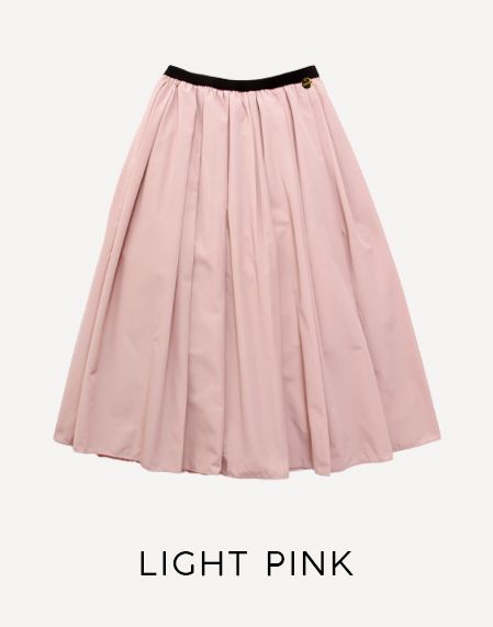 淡い色味のピンクがオフィスにもデイリーにも使えるトレコードの神戸・山の手スカート　ライトピンク。桜のようなカラーのスカートは春コーデにぴったり◎